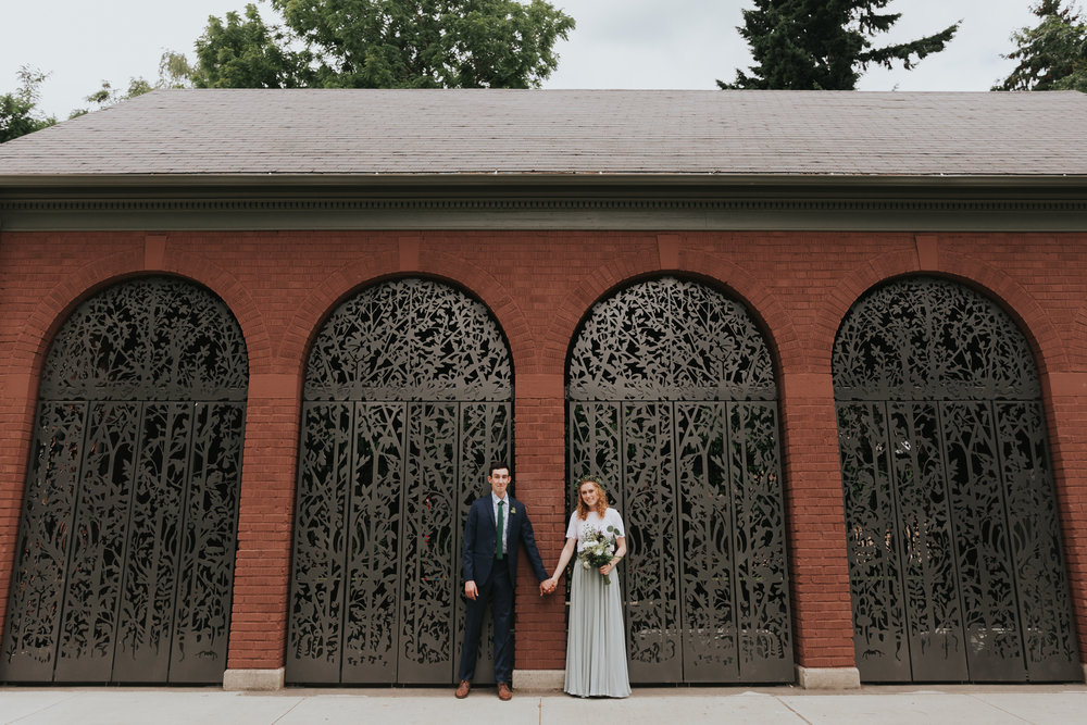 Ragan &amp; Max in front of the Colonel Summers Park gates that Max designed!