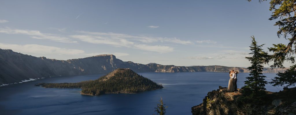 A couple kissing on their elopement day at Crater Lake National Park
